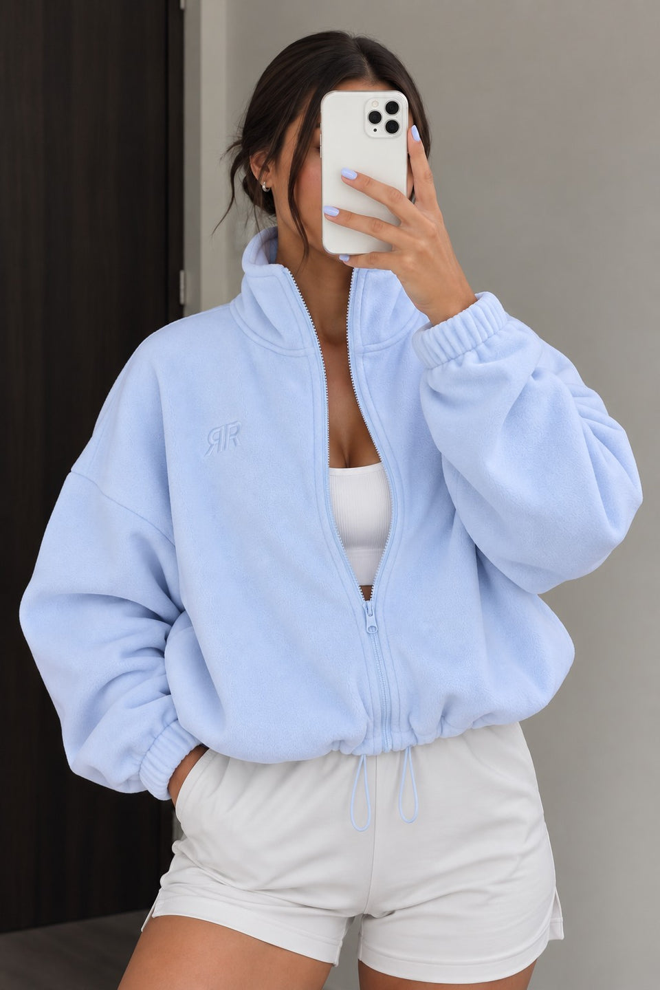 Selfie en el espejo con la Chaqueta Era azul claro